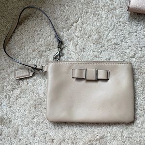 Coach tan wristlet with bow